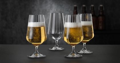 four beer glasses