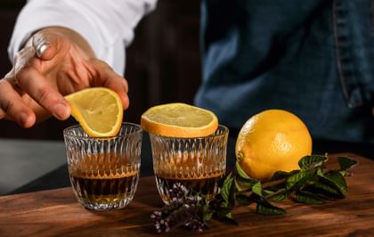 NACHTMANN Barista Ethno glasses filled with espresso and garnished with lemons