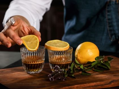 NACHTMANN Barista Ethno glasses filled with espresso and garnished with lemons